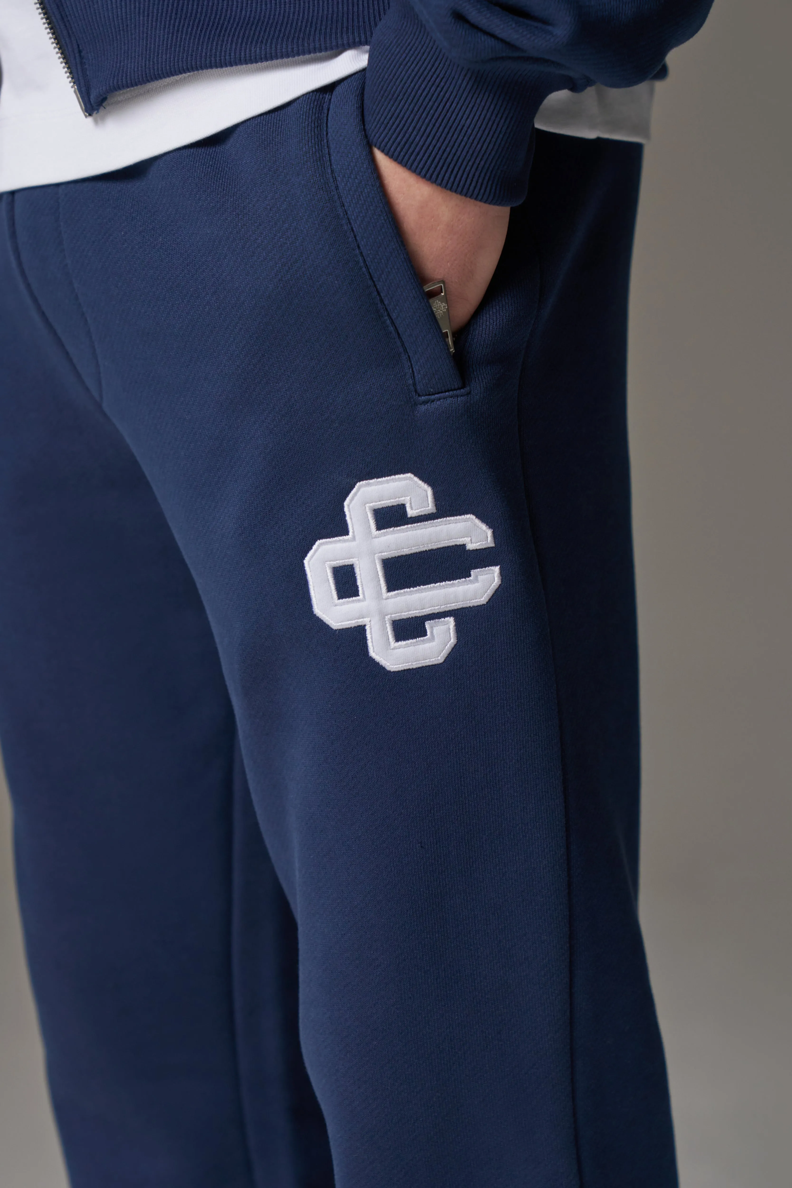 HEAVYWEIGHT EMBLEM APPLIQUE JOGGERS - NAVY
